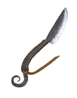 This Medieval Knife is equally useful as either a utility knife or a larger feasting knife. The knife is made from a single piece of high carbon steel; the blade tang forms the grip. Much of it is left rough-polished for a utilitarian and period appearance. The grip is wrapped in leather cord.
Many dark age and Medieval knives were utility tools – for while well-heeled warriors could afford a finely crafted sword, nearly everyone of any means had a need for a basic knife for chores and eating. Though these everyday knives were quality tools their cost could be kept affordable by forgoing the need to create fitted hilt components by simply forging the tang into a form that allowed it to also serve as a handle. Omitting a high level of polish and leaving all but the edge of the tool with a rough level of polish also managed time and costs for producing a practical medieval knife.
Such a tool would look right at home in the craftsmans shed, on the commoners belt and upon the eating table.