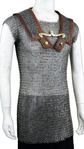 This Roman Lorica Hamata chainmail tunic is crafted from dome-riveted flat rings of stainless steel – the rings are darkened for an antiqued and more authentic appearance. The individual rings are 18 gauge in thickness and 9 mm in diameter.
The shoulder doublet panels are lined with stitched leather; the chest hook which holds them into place is cast from brass.

Construction: Dome Riveted
Ring Type: Flat Rings
Material: Stainless Steel
Ring Size: 9mm – 18 gauge
Finish: Darkened


Medium- fits Chest Size up to 44”
Large – fits Chest Size up to 50”
XL – Fits Chest Size up to 56”
XXL – Fits Chest Size up to 62”
