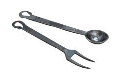 This large pronged fork and ladling spoon are hand forged from iron and are ready for your medieval cooktop and feast table.