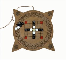 The Viking and Celtic game of Hnefatafl is reproduced here with a gameboard of leather which easily folds up and cinches into a transportable and wearable leather pouch which carries all the game pieces – an excellent way to have a traditional and ancient pick up and play game at the ready when at your reenactment camp, the Ren Faire or around the hearth and campfire.
The Tafl gameboard is made from supple suede leather and its playing board and decorative design are all painted onto the leather. It comes with all the colored glass pieces needed for a game as well as a few spare pieces if needed or when experimenting with new house rules. A simple leather cord can be pulled taut to cinch up the board and transform it into a wearable leather pouch – extra length on the cord can be used to tie it to a belt after it has been fastened. Printed Rules are included and they can also be seen in the product photos.
This is an ancient game with a premise centered around a defensive player who must use his pawns as bodyguards to allow his King to escape a larger attacking force who seek to capture the King at all costs. The origins of Hnefatafl likely go as far back as the Roman Empire – Through the Dark Ages and into the Medieval period Tafl could be found played by Vikings, Scots, Irish, Welsh, Anglo Saxons and more and it lasted well into the 18th century in rural Sweden and Finland – every locality had its own version of rules and the game lends itself to being easily modified to suit new types of rules and playstyles. The version reproduced here is a version that began to be played in Ireland after the arrival of the Dublin Vikings who likely brought this form of the game with them to Ireland.
This form of Hnefatafl with a 7×7 gameboard is the Brandubh version (Brandubh means Black Raven) which is easier to learn and play than the larger variants of the game, making this an ideal beginning into playing Tafl and for having a game that does not look intimidating and difficult to learn to newcomers when you challenge them to a round. The larger versions can also be modified to work on this smaller board as well.