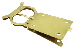 This belt buckle is made to take a belt or strap sandwiched between its brass plates with the whole construct riveted in place.