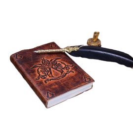 
Out on another Quest with your cadre of Assassins? Record all your experiences and perilous encounters in this leather journal for the Creed of Assassin!
This journal is handmade from genuine buff leather that makes it sturdy, offering longevity. The diary comprises 110 natural handmade papers that are firmly bound. Its dimensions are approx. (7 X 5) inches.
