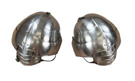 The Avenger Pauldrons are crafted from riveted segments of 18 gauge steel. The pauldrons are articulated due to their riveted construction and inner bands of leather. The interior of the pauldrons are blackened.
Please Note: Some of the photos display other accessories which are not included with the pauldrons and are available separately. There are some photos that show the isolated components of this pauldron set on their own for clarity.