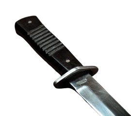 This replica of a WW1 German Army Trench Knife has a blade of high carbon steel – it is stamped with replica makers marks and inspection stamps for authenticity. The guard is steel and the grip is two halves of wood riveted to the blade tang. The sheath is of steel and it is fitted with a leather belt loops and retaining strap.
Designed for close-quarters fighting in the trenches of WW1, this dagger is small enough to be handy in the densest of trench scrums, but large enough to be both menacing and deadly.