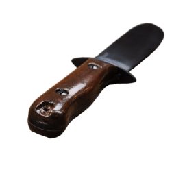 This recreation of the British Rodgers-Sheffield Type D Survival Knife has a blued blade of high carbon steel; it is faithfully reproduced with with manufacturer and armory markings. The grip is two wooden grip halves stoutly riveted to the thick blade tang. The knife comes with a sheath of stitched and riveted leather with an integrated belt loop and grip retaining strap.
The British Type D Survival Knife was issued to all branches of the military after its introduction in the 1950s. Based on the codes stamped on the blade it can be discerned what branch of service the knife was issued to. The knife shown here is a replica of a Type D that was issued to the Royal Air Force as designated by a stamped serial code beginning with 27C.
This robust survival knife has a thick-spined blade well able to chop and hack through durable targets. Its contoured grip securely fits the palm of most hands quite well.