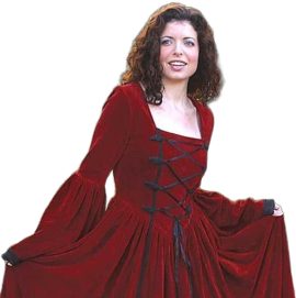 You will feel like you’ve stepped into the pages of a fairy tale when you wear this elegant gown. Made of a heavy, red 100% cotton velvet, the dress has full bell sleeves and a generous full skirt. Matching handmade frogs compliment the lace-up front, while the back laces as well. Dry Clean Only.