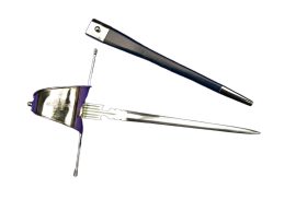 This main gauche can be stylistically paired with the Musketeer Rapier to create a matched sword and dagger set. Available separately (SKU 500784)
Carried at the back for a left hand draw, the main gauche was often brought into play with the rapier for a two handed fighting style. The Musketeer Main Gauche features an unsharpened high carbon steel blade with cut-outs and notches to slow or disrupt an opponent’s blade. The guard is polished steel with an etched cross design, while the grip it wood with a wire wrap. Includes a matching leather scabbard with steel accents.