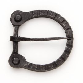 This Forged Knightly Belt Buckle is a bit thicker iron and ruggedly from our Medieval Belt Buckle and built to handle the rigors of thicker belts and the gear carried on them. Simple, yet elegant. Fits up to a 1-1/4" belt.     Approx. 2-7/8" x 2-1/2"  