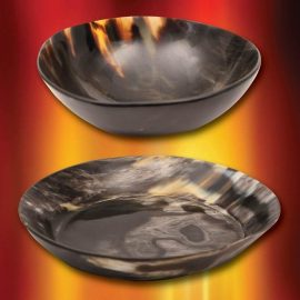 This beautiful plate and bowl set is real natural horn and makes a statement whether you are entertaining or feasting at an event. Perfect for Viking and Medieval settings! Plate and Bowl also available seperately.   Plate Measures: Approximately 7-1/2" across  Bowl Measures: Approximately 7" across  Please Note: Due to the natural material the color and pattern may vary.