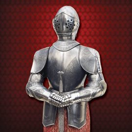 The 16th Century Etched Spanish Suit of Armour is a full-sized replica suit of 16th century Spanish armour, based on the ones use during the reigns of Charles V and Philip II, which today are a part of the collection of the Real Armeria in Madrid.
The armor is meticulously handcrafted and is made in polished steel and iron, characterized by floral figures etched on the largest part of its surface. The suit of armor includes an arabesque fabric gown, sword and wooden platform, reinforced with metallic angles. A space in the helm is left open, allowing for decorative ostrich plumes be inserted if desired.
This medieval knights suit of armor is an exceptionable symbol of historic and noble times that can be adapted to any interior decor. Handcrafted in Toledo Spain, these suits of armor are the best replicas you can find. Their unrivaled quality and historical authenticity makes them a valuable and impressive collector item!
 View more products from Marto