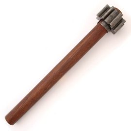This British trench club was made by placing a flanged metal ring on a standard entrenching tool handle. While the First World War is strongly associated with the introduction of modern weaponry, primitive melee weapons still had a place in the close-quarters fighting encountered during trench raids. Decommissioned or broken heavy machinery was often re-purposed and you can see the cog-like look as though this could have been a gear from a tank or other large artillery. There was no shortage of uses for parts.  We've come across Canadian and British versions of this club which was sometimes referred to as a ‘knobkerry’ reinforcing its popularity and effectiveness. This durable and devastating weapon has a steel shim with the flanged ring over the top which is then pinned through. All of aged steel. Shaft is solid, stained hardwood.
