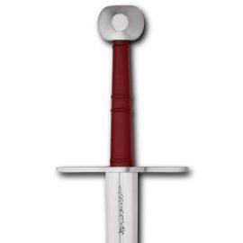 Royal Armouries Sword #IX.915. An imposingly large hand-and-a-half sword or longsword, probably of the late-14th century.
The precise origin of this European sword is unknown, but from the markings it is likely to be German or possibly Italian. It found its way into the Arsenal of Alexandria possibly as a diplomatic gift, war booty or as a tribute object to the Sultanate of Egypt, where it was inscribed with Arabic text. From there it made its way into at least one private collection, before subsequently being acquired by the Royal Armouries.
This big knightly sword features a broad and powerful Oakeshott Type XVIa blade of 38 inches. This is quite a heavy sword by the standards of the day, due to the length and breadth of the blade, but is wonderfully balanced thanks to the distal taper, long grip and large pommel. Similar swords to this can be seen extensively in late-14th and early-15th century art, including manuscripts and also knightly effigies and brasses.
Such swords were popular at this time all over Europe, from England to Italy, from Portugal to Poland, and they are featured in a number of contemporary fighting treatises like Fior di Battaglia by Fiore delli Liberi (1410). They were used on foot and mounted, in armour and unarmoured, with one hand or two-handed. This example is an especially powerful cutting weapon and less specialised to the thrust than some other longswords of the time.
Our replica closely matches the original in all aspects of form, measurements and manufacture.
 
Note - It is important to note when purchasing a licensed collectible that for legal & liability reasons the licensor may not allow a sharpening service to be performed. This in no way affects the overall value and/or performance of your edged collectible, and unfortunately is not within our power to change. Should you choose to sharpen your edged collectible after sale, the licensor and licensee are not held liable for any damage or injury that may result from its use or handling.
Official Royal Armouries Licensed Product. The Royal Armouries name is a trademark of Royal Armouries. All Rights Reserved. The Royal Armouries is the UK’s National Museum of Arms and Armour.