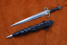 
The Darksword Armory Mother of Dragons sword is inspired by this character. While in the series Queen Daenerys rarely wields a weapon herself, this sword is designed after what she might have wielded as the mother of the only dragons in existence.
Hand forged from 5160 High Carbon Steel
Differential Hardened at a Rockwell of 60 at the Edge; 48-50 at the core.
Fittings: Solid Bronze
Handle: Textured Ebony Grip
Total length: 26.5″
Blade length: 20″
Blade width at base: 2.1″
Weight: 2 lbs 9 oz.
POB: at crossguard